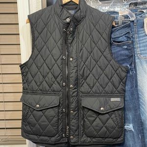Polo Gilet, size M in black quilted with front and side pockets